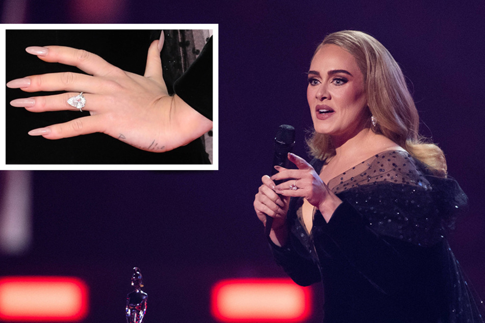 Adele flaunted a massive Lorraine Schwartz diamond ring on her left hand at the BRIT Awards on Tuesday.