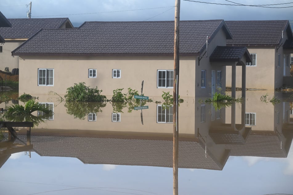 Residents in Jamaica called Hurricane Melissa "devastating" as they moved to pick up the pieces left by the storm.