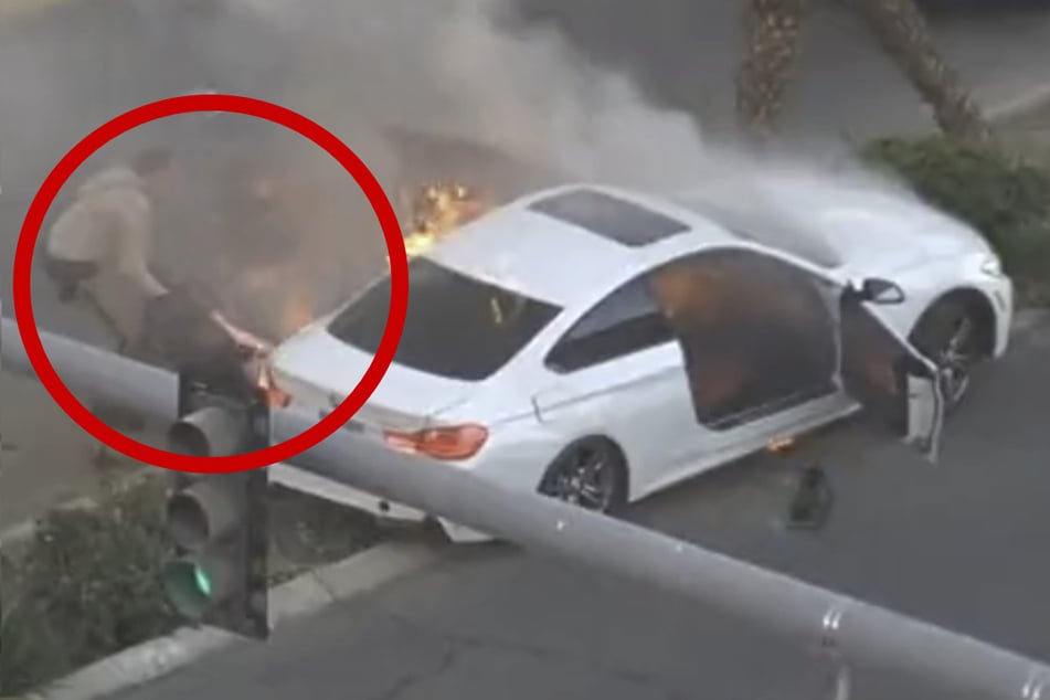 Filmreife Rettung! Fahrer in letzter Sekunde aus brennendem Auto gezogen
