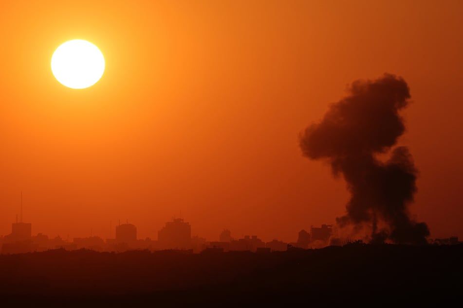 This picture taken from a position at Israel's border with the Gaza Strip on Wednesday shows smoke billowing during an Israeli strike on the besieged Palestinian territory.