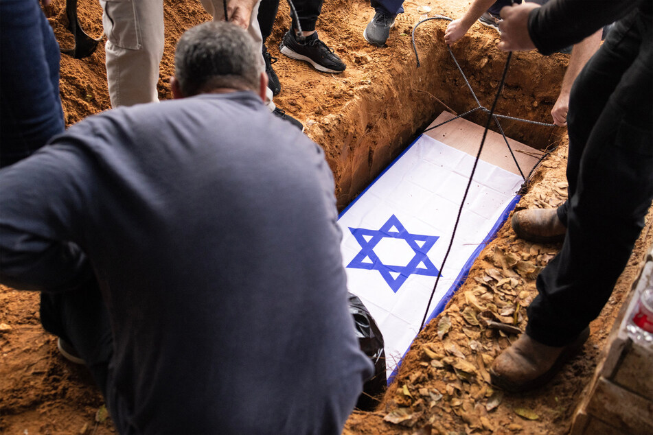 The grave of Alon Shamriz, mistakenly killed by Israeli forces in Gaza earlier in the week after being held by Hamas since the October 7 attack, was seen during his funeral near Tel Aviv on Sunday.