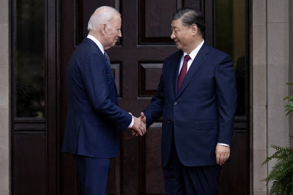 President Joe Biden greets Chinese President Xi Jinping before a meeting during the Asia-Pacific Economic Cooperation (APEC) Leaders' week in Woodside, California on November 15, 2023.