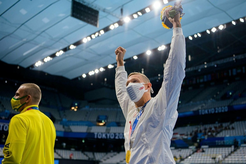 Caeleb Dressel set an Olympic record while winning his first individual gold medal on Thursday.