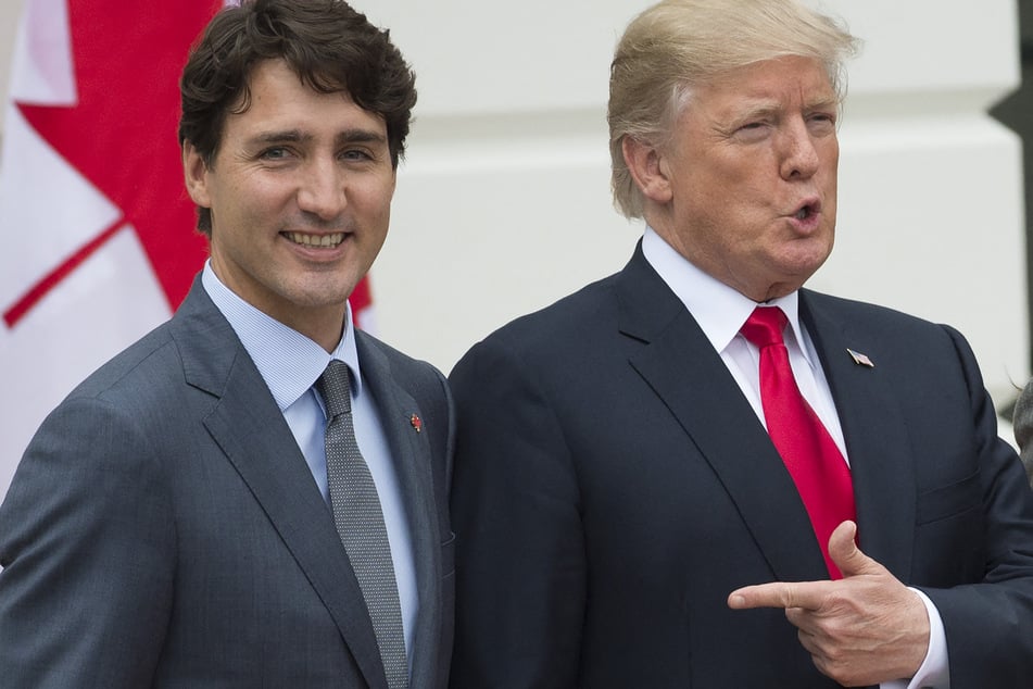 US President Donald Trump (r.) welcomes Canadian Prime Minister Justin Trudeau (l.) at the White House in Washington, DC, on October 11, 2017.