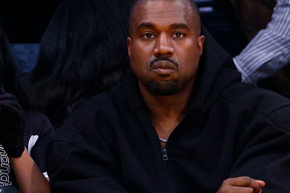 Kanye West attends a Los Angeles Lakers game in March.