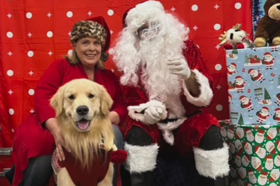 After all the drama, Broggie the dog gets a peaceful photo with Santa Claus, who looks completely exhausted.