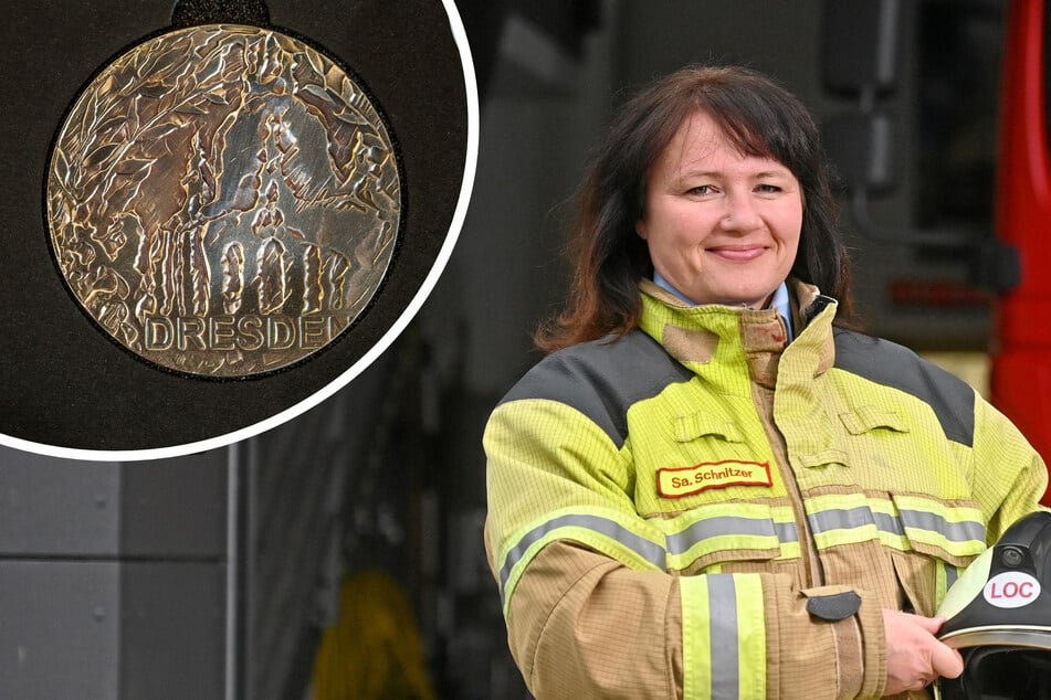 Dresden: Hilbert schenkt Dresdens erster Feuerwehrchefin eine Münze