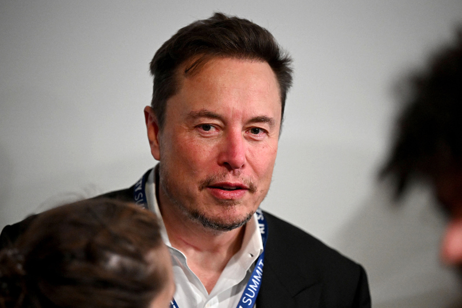 Elon Musk attended Wednesday's AI summit, where he told reporters that the event was "timely."