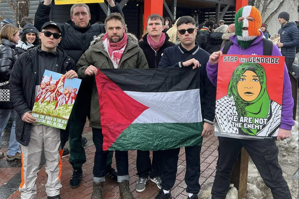 Members of the band Kneecap participate in a rally for Palestinian liberation in Denver, Colorado.