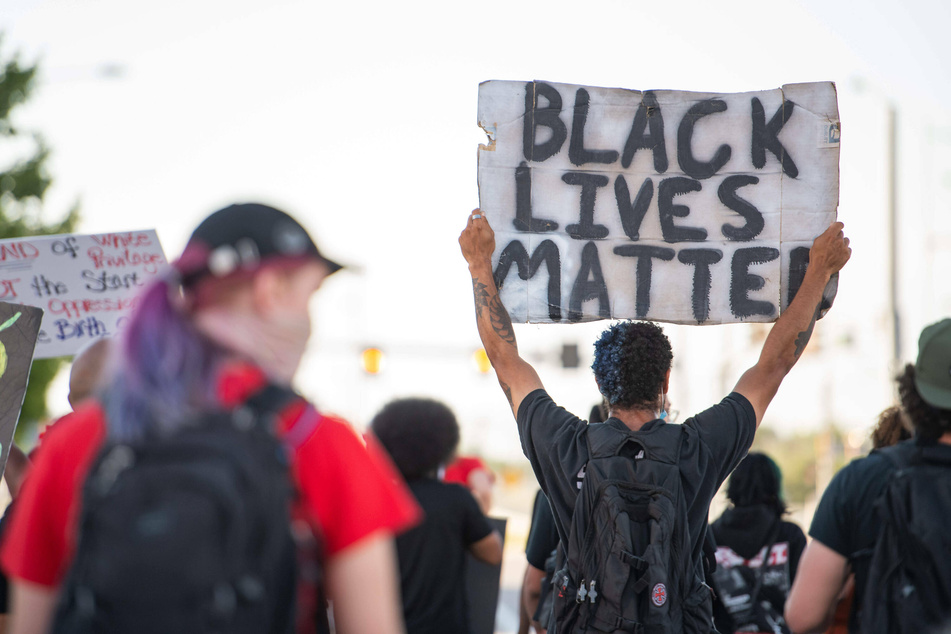 Hundreds of Black Lives Matter demonstrators surrounded the Aurora Police Station on July 3, 2020, to protest the death of Elijah McClain and others.