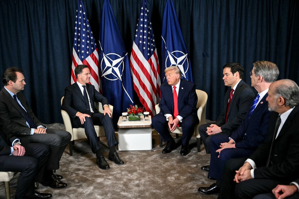 President Donald Trump speaks with NATO’s Secretary-General Mark Rutte next to Secretary of State Marco Rubio, Treasury Secretary Scott Bessent, and Secretary of Commerce Howard Lutnick during a bilateral meeting on the sidelines of the World Economic Forum in Davos, Switzerland, on January 21, 2026.