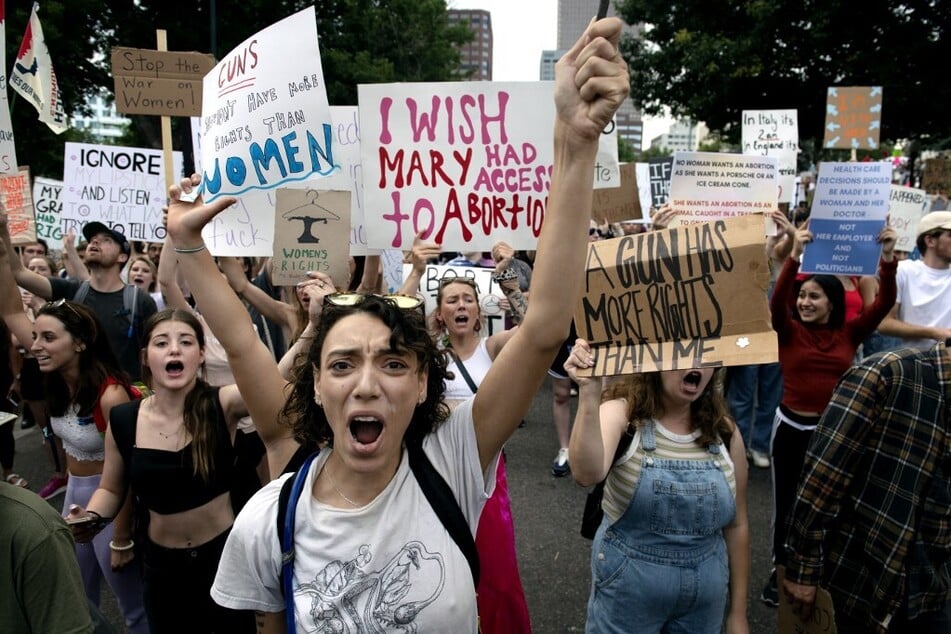 Protesters march for abortion rights in Denver, Colorado, on June 27, 2022, four days after the US Supreme Court struck down the federal right to abortion.