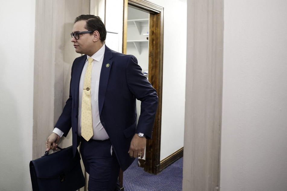 Rep. George Santos leaves his office in the Longworth House Office Building in Washington DC.