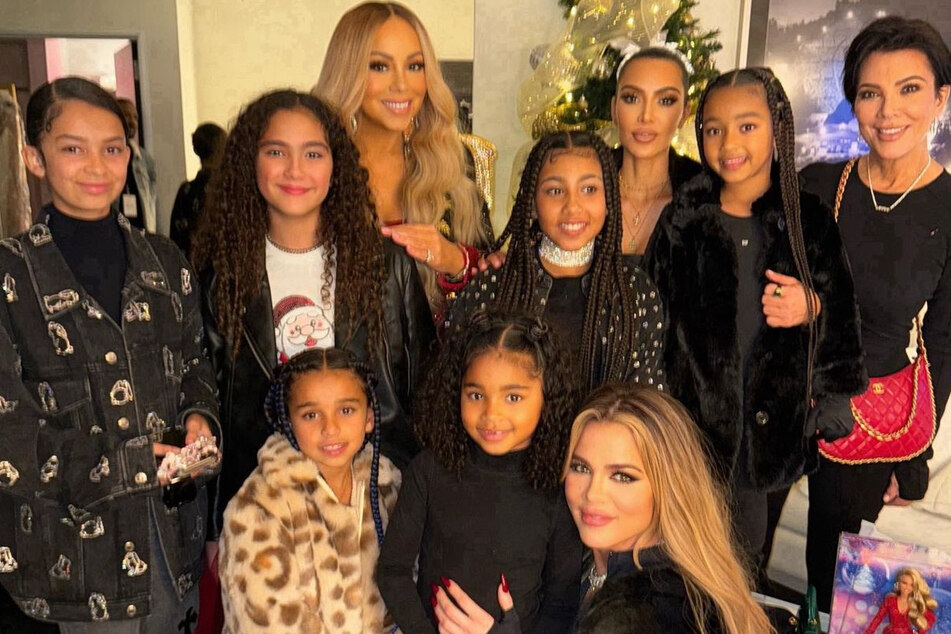 The Kardashian family made some festive memories at Mariah Carey's (c) Christmas show.