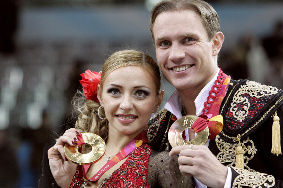 Roman Kostomarow (46, r.) mit seiner Eistanz-Partnerin Tatjana Nawka (48) bei den Olympischen Winterspielen 2006 in Turin.