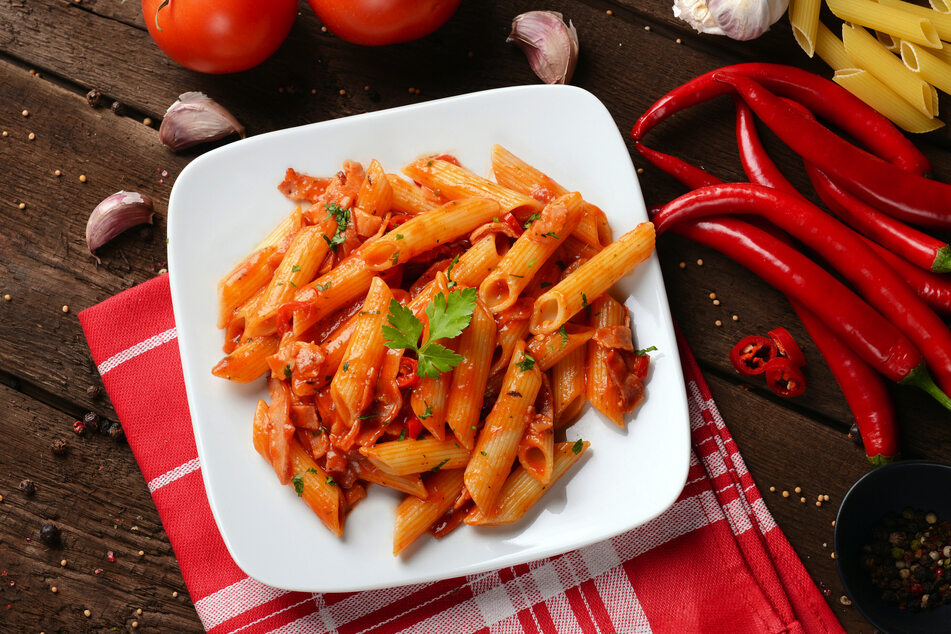 An authentic arrabiata sauce has no meat or cheese, and is made up of only the basic ingredients.