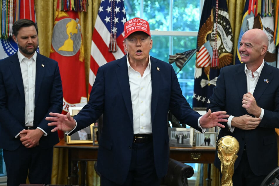 Donald Trump (c.) revealed Friday that the 2026 World Cup draw will be held at the Kennedy Center in Washington DC.