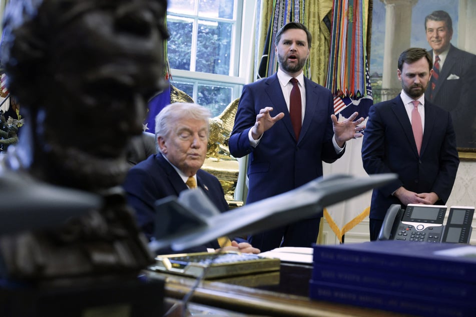 Vice President JD Vance (c.) was tapped by President Donald Trump (l.) to lead a new national anti-fraud task force targeting the nation's social-welfare programs.