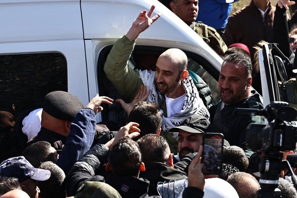 A former Palestinian prisoner held by Israel is welcomed by friends and relatives upon arriving in the occupied West Bank city of Ramallah on February 15, 2025.