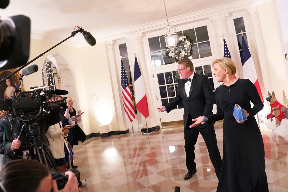 MSNBC television hosts Joe Scarborough and his wife Mika Brzezinski arrive for the White House state dinner on December 1, 2022.