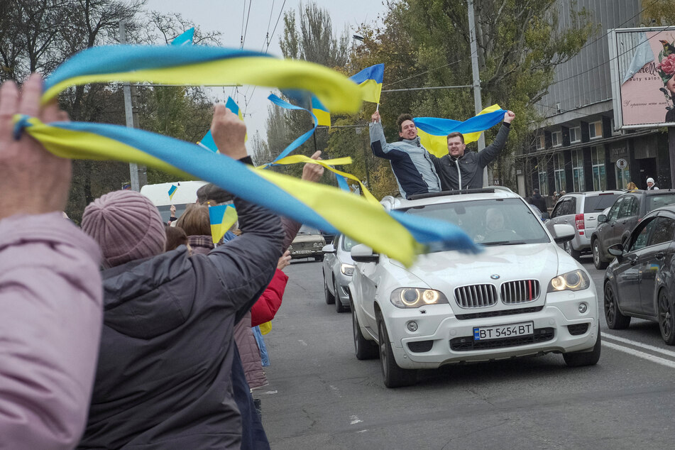 Local residents celebrated in the streets after Russia's retreat from Kherson, Ukraine.