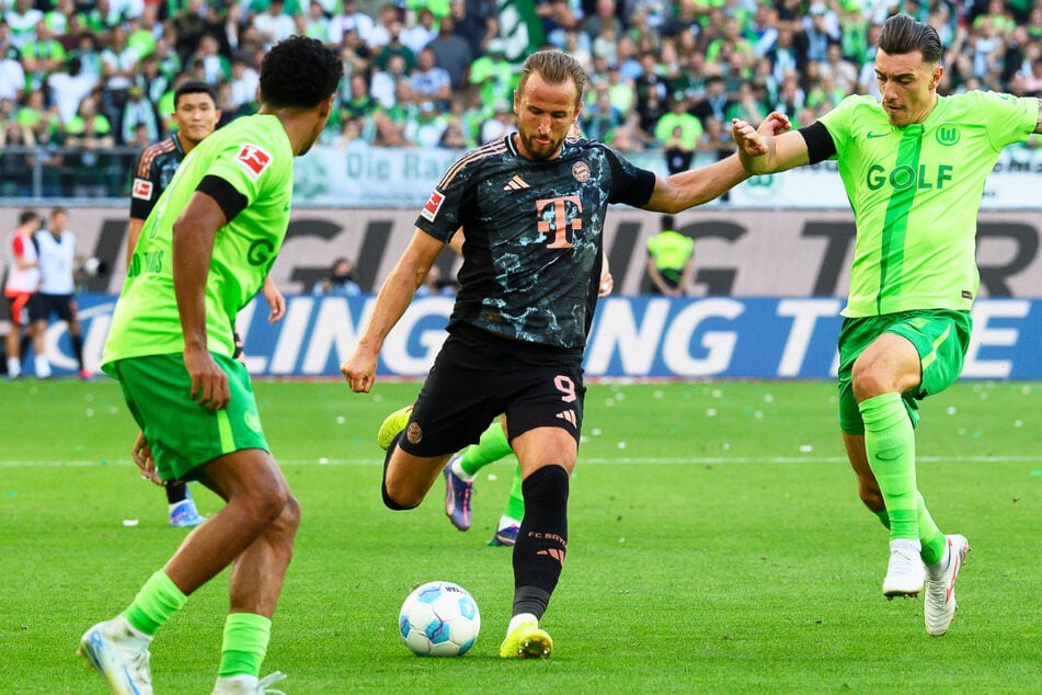 Beim 3:2 der Bayern zum Bundesliga-Auftakt in Wolfsburg legte Harry Kane (31, M.) zwei Treffer auf.