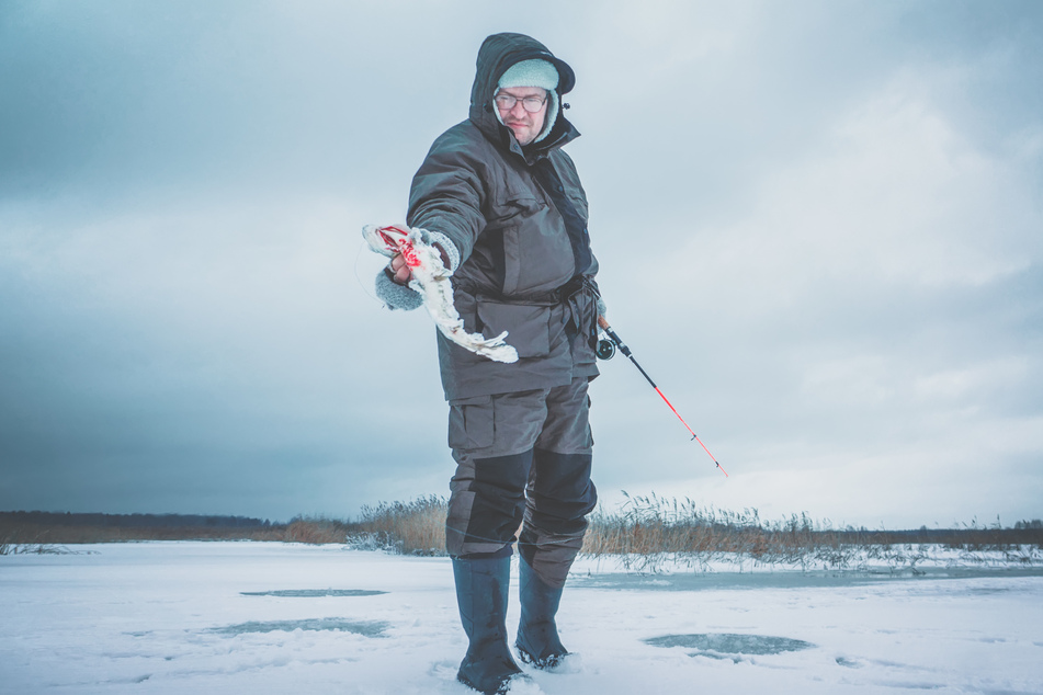 Ice fishers need to be careful where they put their phones while angling (stock image).