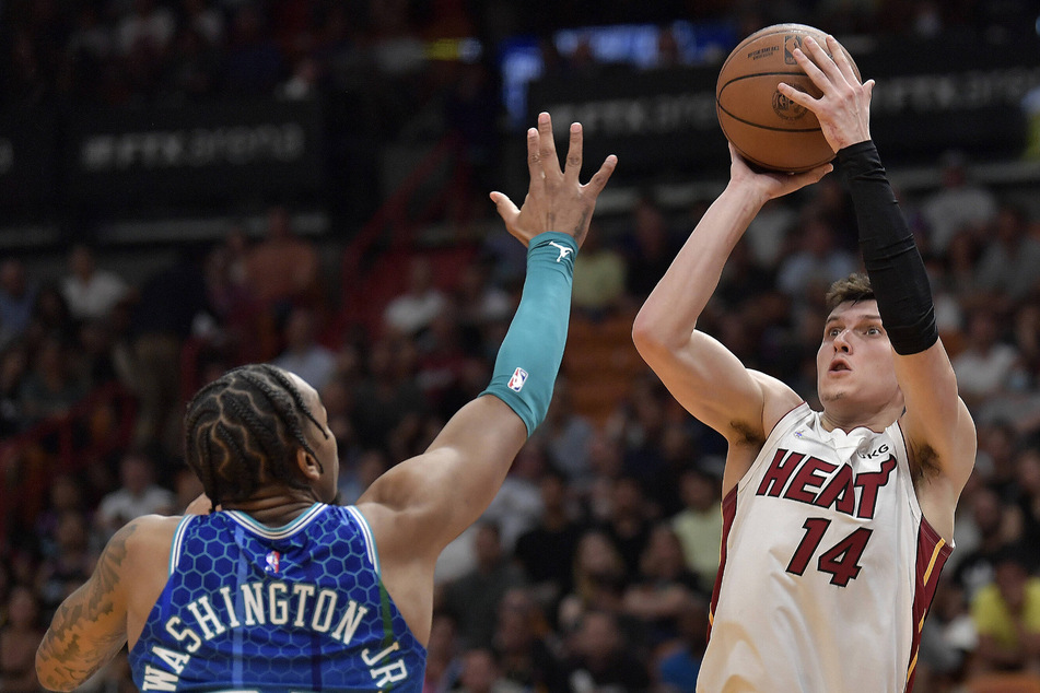The Heat's Tyler Herro (r.) tied the single-game franchise record for points off the bench with 35.