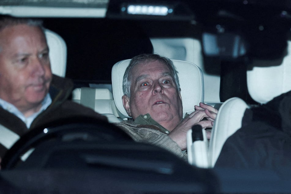 Andrew Mountbatten Windsor leaves Aylsham Police Station in a vehicle on February 19, 2026.