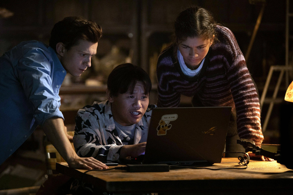 (From l. to r.) Tom Holland, Jacob Batalon, and Zendaya star in Spider-Man: No Way Home. The trio try to undo the mess of the multiverse which resulted from Dr. Strange's spell.