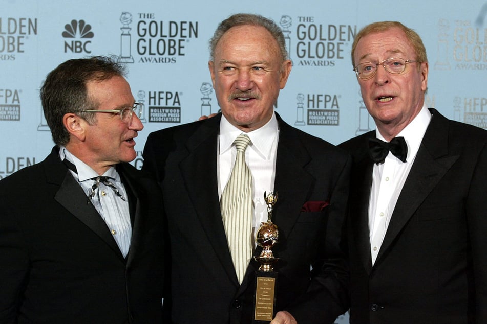 Gene Hackman (M.) mit seinen Schauspiel-Kollegen Robin Williams (l.) und Michael Caine bei den Golden Globes 2003. (Archivfoto)