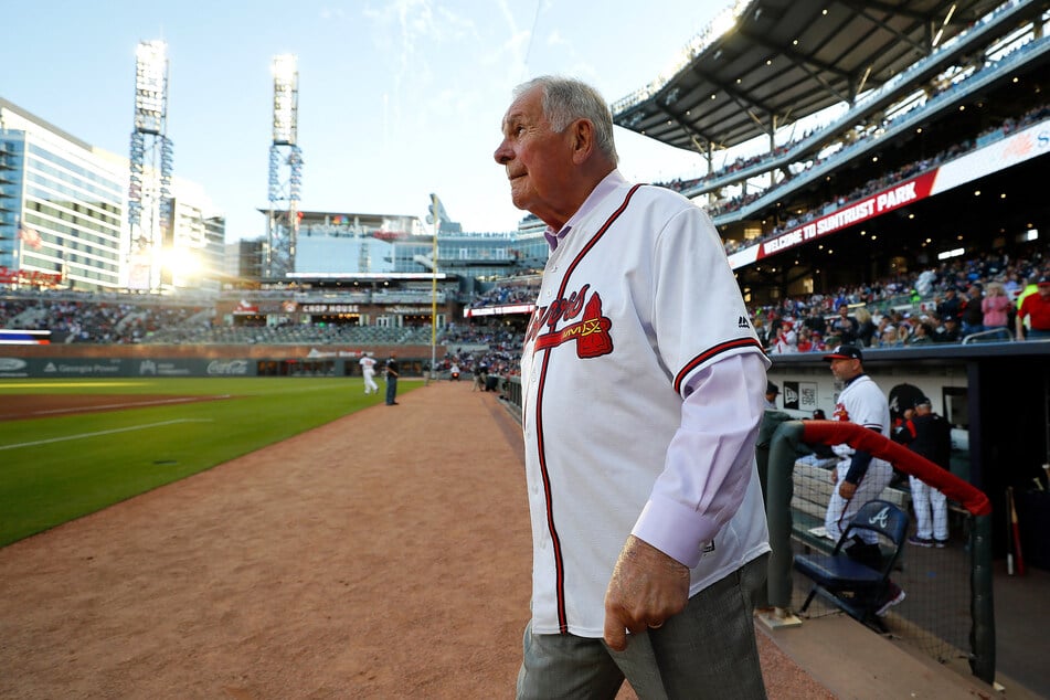 Bobby Cox, former manager of the Atlanta Braves, walks onto the field to give the command to "play ball" prior to their game against the Chicago Cubs on April 1, 2019.