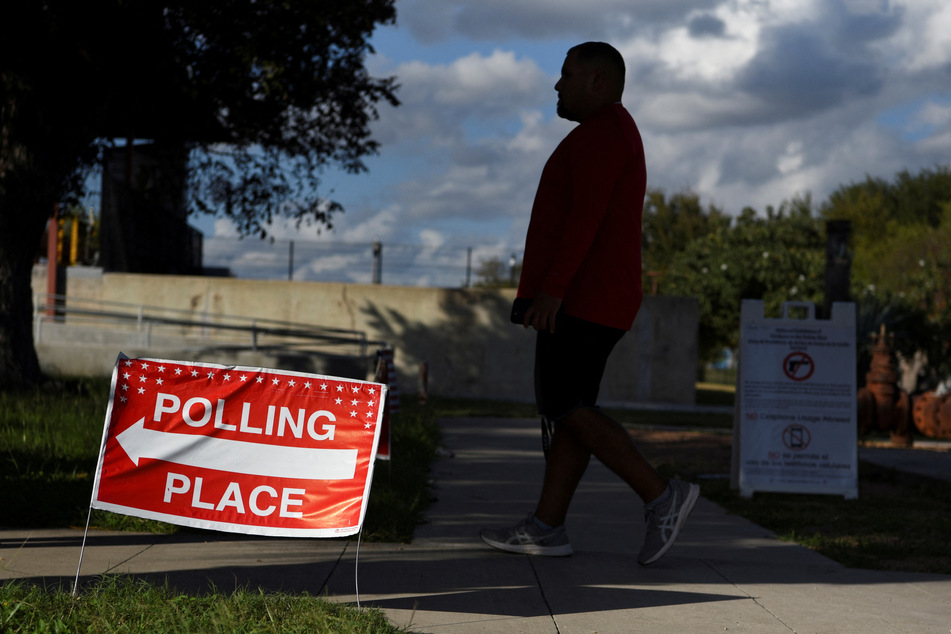 A voter waits in line to cast their ballot during the 2022 midterm elections in McAllen, Texas.