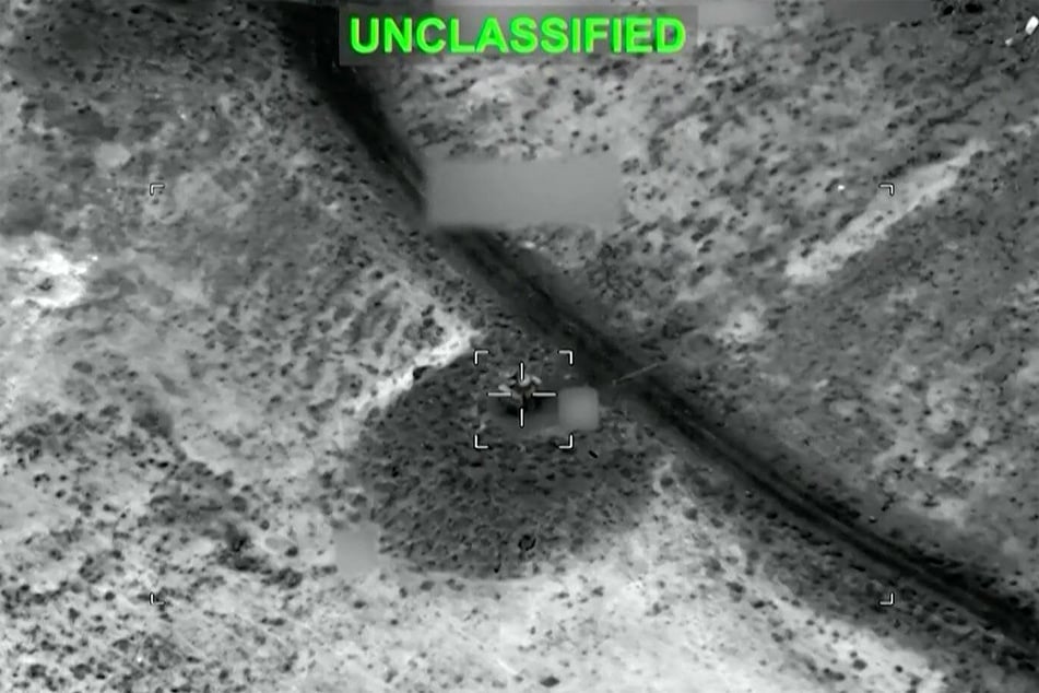 A screen grab taken from video footage shared by US Central Command on social media on July 13, 2026, purportedly shows US strikes against Iranian military installations.