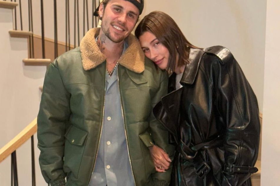 Fans are worried for Justin and Hailey Bieber (r.) after the latter's dad reposted an Instagram video that implored everyone to pray for the couple.