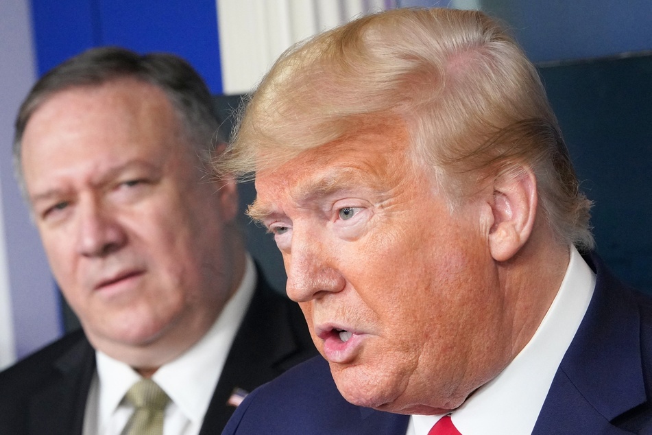 In a recent interview, Mike Pompeo (l.), the former Secretary of State, said he would be "inclined" to be vice president if Donald Trump asked him to.