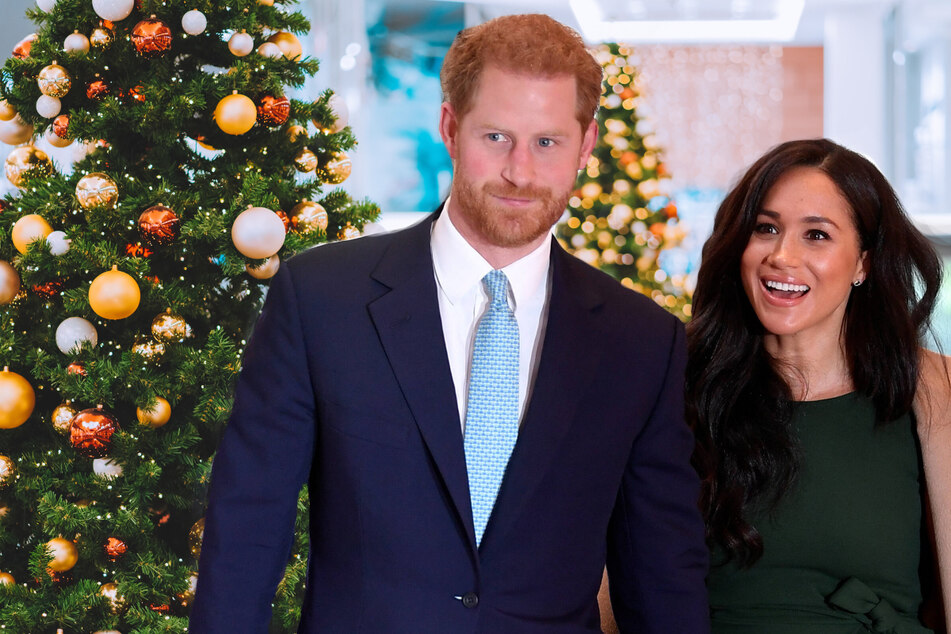 Prince Harry and Meghan Markle shared their Christmas card on Thursday with a note that they had made donations on behalf of their fans.