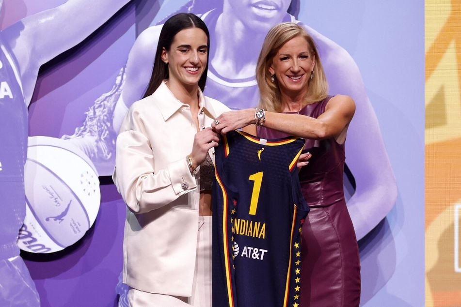 Caitlin Clark's (l.) Indiana Fever jersey sales made history as the highest-selling jersey from any sports draft night.