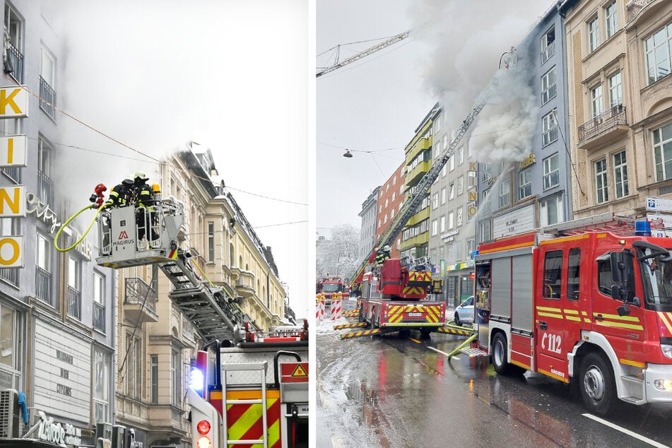 Während Menschen über die Drehleitern gerettet wurden, löschten Einsatzkräfte die Flammen.