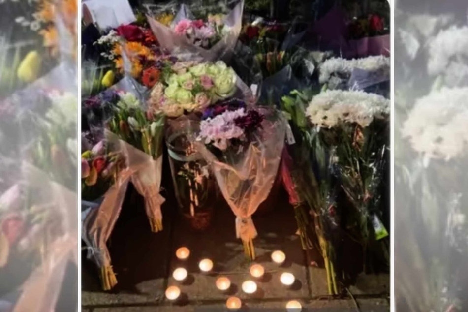 Am Sonntagabend legten Hunderte Menschen am Ort des Unglücks Blumen nieder, zündeten Kerzen an und versammelten sich zu einer Mahnwache.