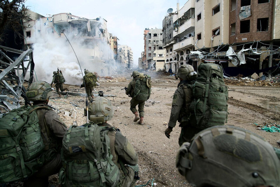 Israeli soldiers engage in a ground invasion of the occupied Gaza Strip amid the ongoing assault on Palestinians.