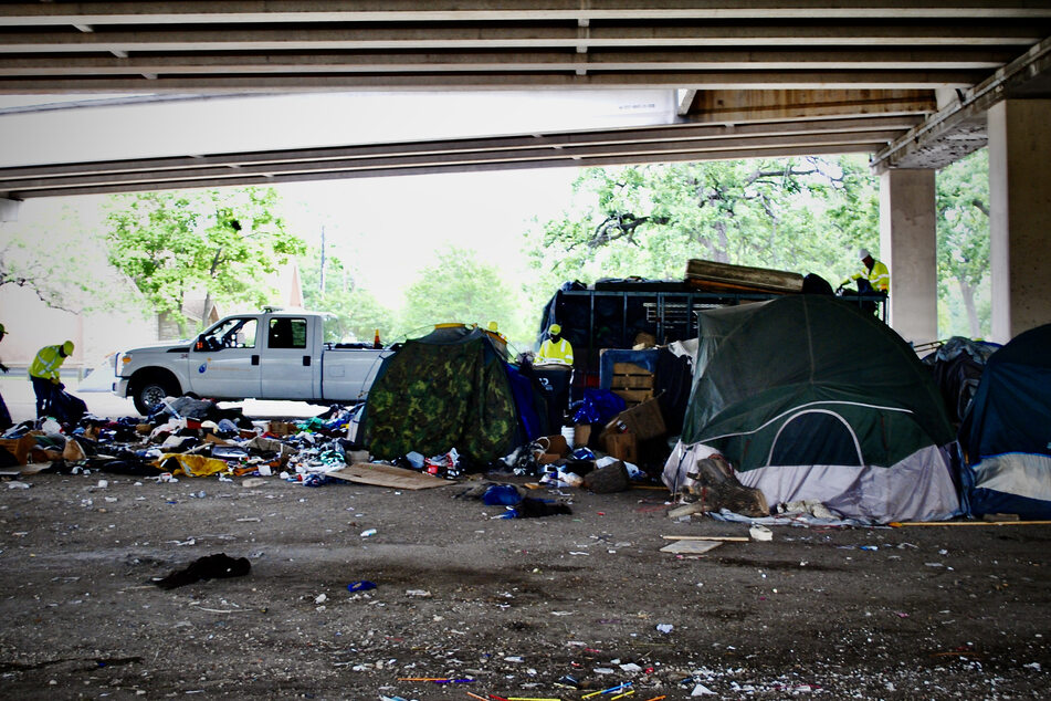 Crews showed up on Tuesday morning to begin the clean-up and clear-out process at encampments in Austin, Texas.