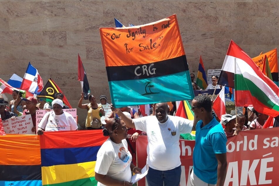 Chagossians protest the UK's defiance of a United Nations deadline to end their illegal occupation of the Indian Ocean archipelago.
