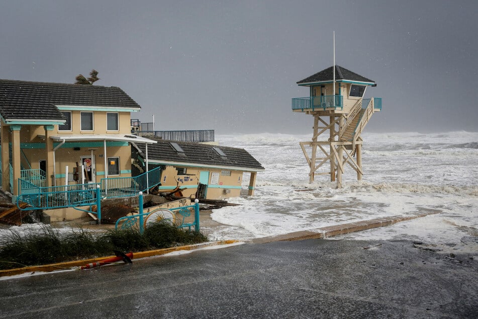 Waves crash into a Volusia County building after Hurricane Nicole made landfall.