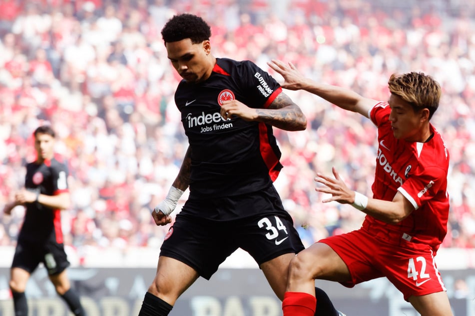 Ritsu Doan (r.) brachte in der 27. Minute den SC Freiburg in Führung.