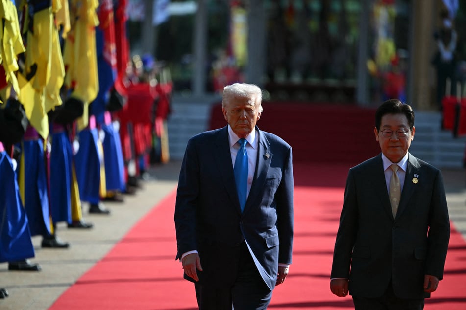 US President Donald Trump and South Korean President Lee Jae Myung leave after a high honor presentation ceremony at the Gyeongju National Museum on October 29, 2025.