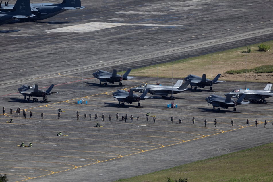 US military buildup in the Caribbean continues as President Donald Trump threatens the country with war.