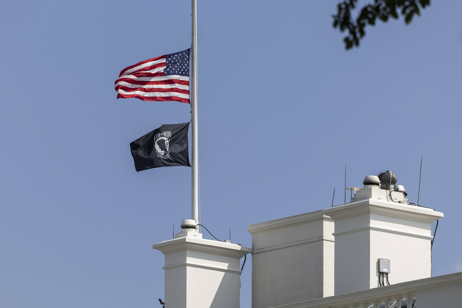 The US flag was flown at half-staff above the White House in Washington DC on Friday after a suicide bombing from ISIS-K killed more than 100 people, including 13 US troops, outside Hamid Karzai International Airport in Kabul.