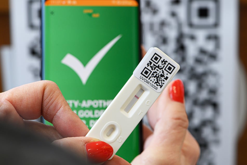 Das Ergebnis eines Corona-Schnelltests wird in der "pass4all"-App angezeigt.