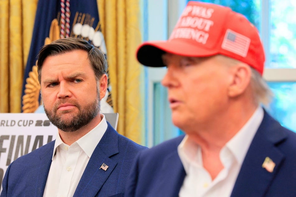 Vice President JD Vance (L) and President Donald Trump (R) during an Oval Office press conference in Washington DC on August 22, 2025.